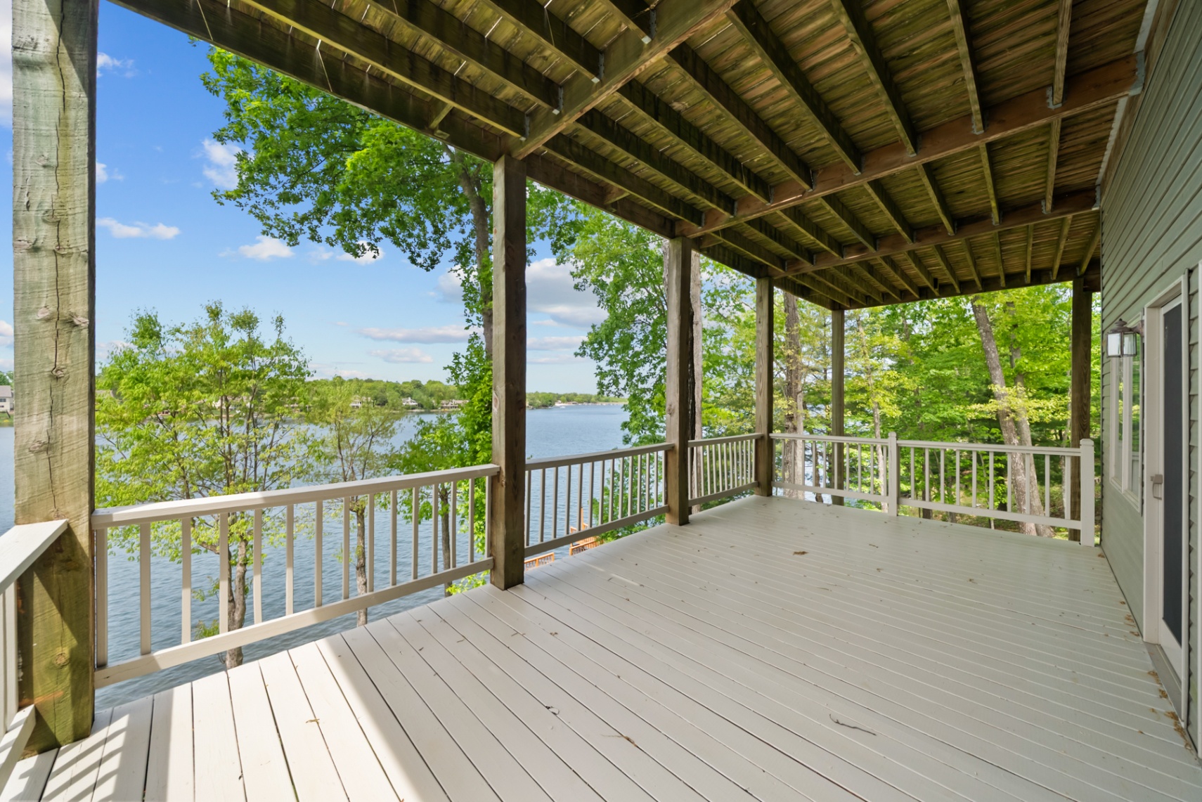 Covered lower deck with open lake views