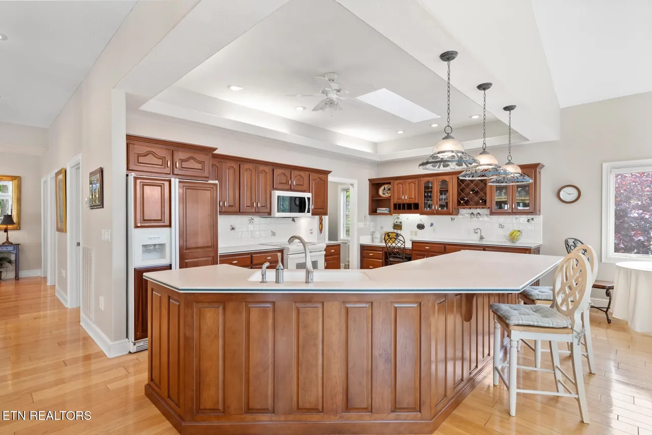 Kitchen with large island and walk-through pantry